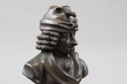Pair of patinated bronze desk busts representing...