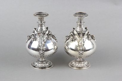 Pair of silver vases of Renaissance style....