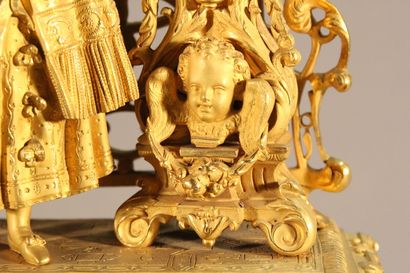 Clock in gilded and chased bronze.

The upper...