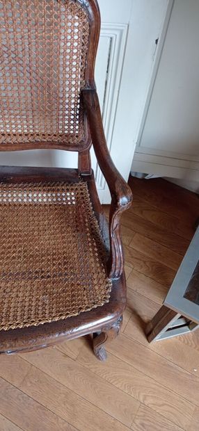 Armchair in natural wood molded and carved...