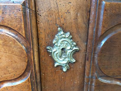 Molded walnut chest of drawers of slightly...