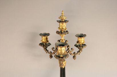 Pair of bronze and black marble candlesticks...