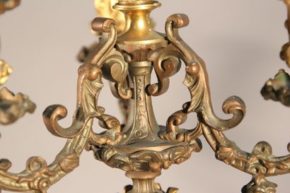 Pair of bronze and black marble candlesticks...