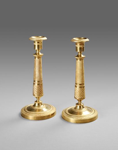 Pair of ormolu and chased bronze torches....