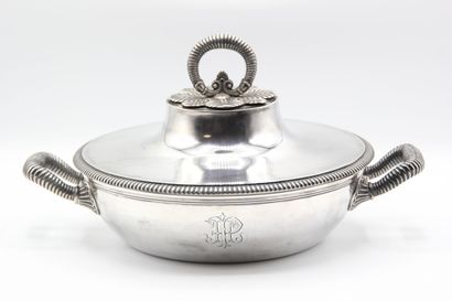Silver covered vegetable dish.

Body and...