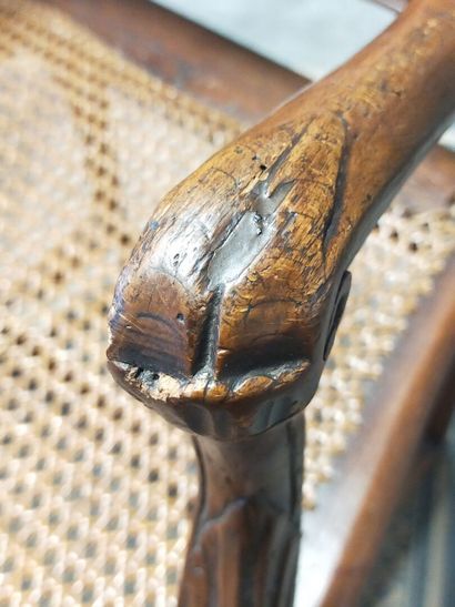 Armchair in natural wood molded and carved...