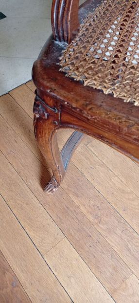 Armchair in natural wood molded and carved...