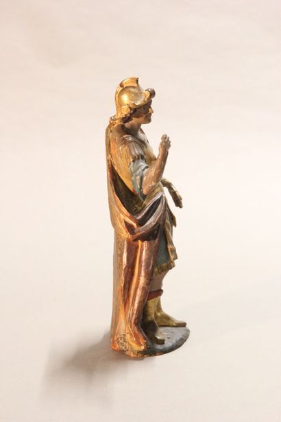 Antique soldier in armor.

Subject in polychromed...