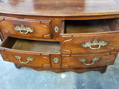 Molded walnut chest of drawers of slightly...