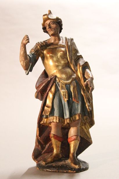 Antique soldier in armor.

Subject in polychromed...