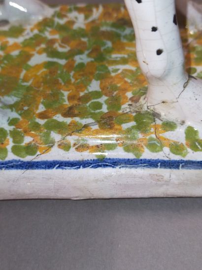 Pair of seated dalmatians in polychrome earthenware.

Rectangular...