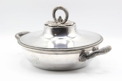 Silver covered vegetable dish.

Body and...