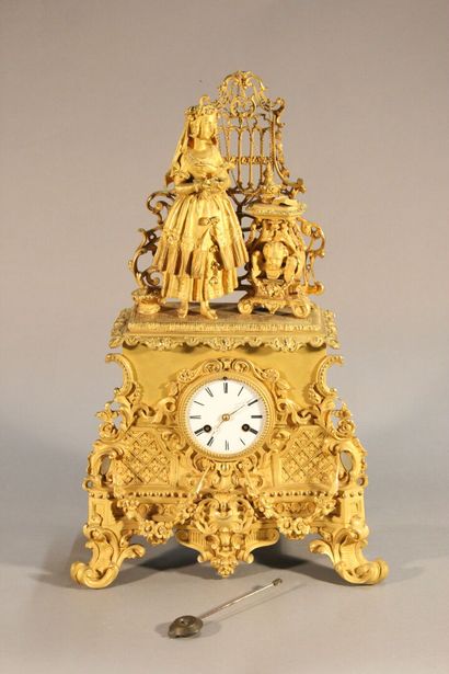 Clock in gilded and chased bronze.

The upper...
