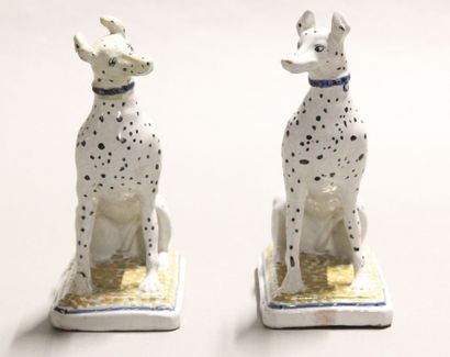 Pair of seated dalmatians in polychrome earthenware.

Rectangular...