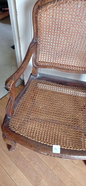 Armchair in natural wood molded and carved...