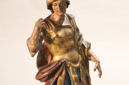 Antique soldier in armor.

Subject in polychromed...