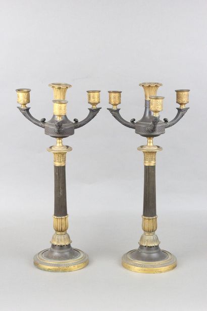 Pair of candelabras with four lights in chased,...