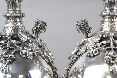 Pair of silver vases of Renaissance style....