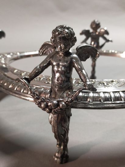Table top in silver plated metal in two parts.

The...