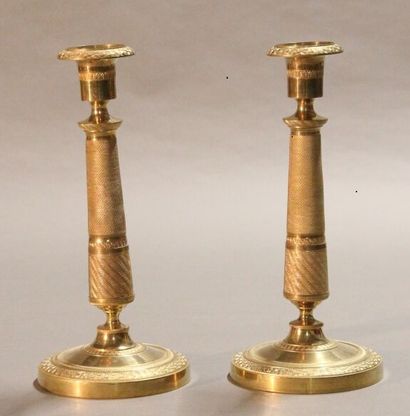 Pair of ormolu and chased bronze torches....