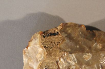 Biface in cut flint.

Provenance: Vienna...