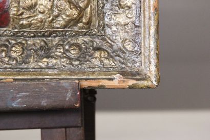 Mirror in red scales and gilded copper.

Decorated...