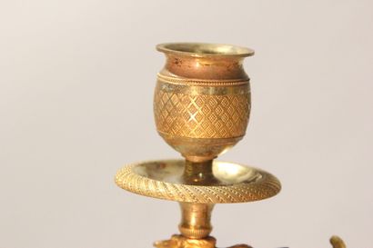 Small chandelier in gilded and chased bronze.

With...