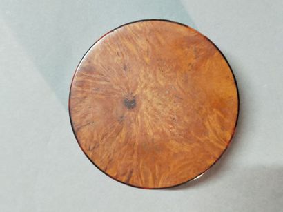 Small circular box in tortoiseshell and burr...