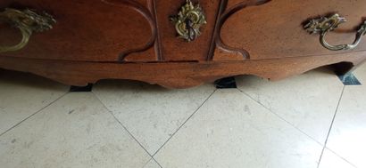 Molded walnut chest of drawers of slightly...