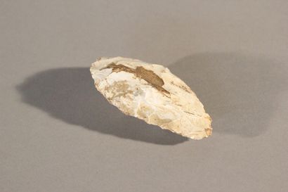 Carved stone biface.

Provenance: Cagny,...