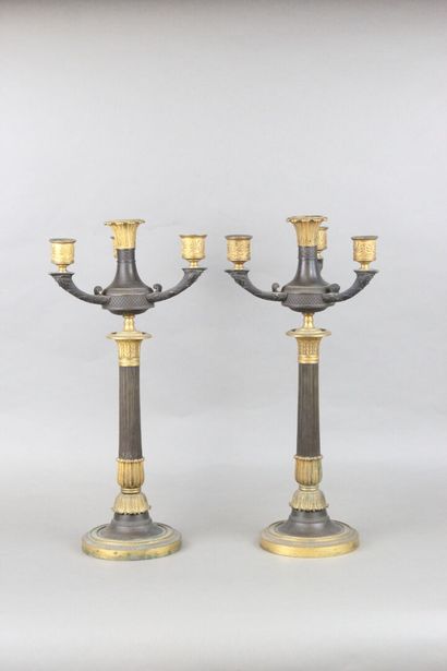 Pair of candelabras with four lights in chased,...