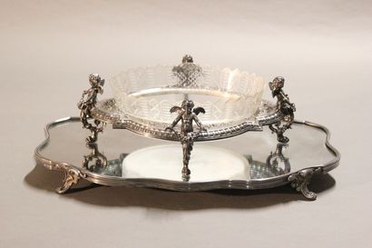 Table top in silver plated metal in two parts.

The...