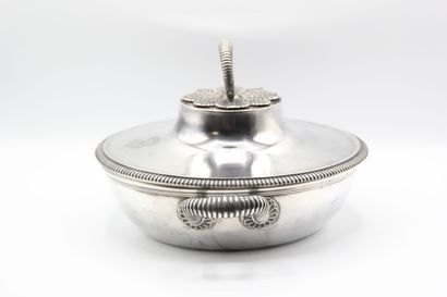 Silver covered vegetable dish.

Body and...