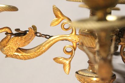 Small chandelier in gilded and chased bronze.

With...