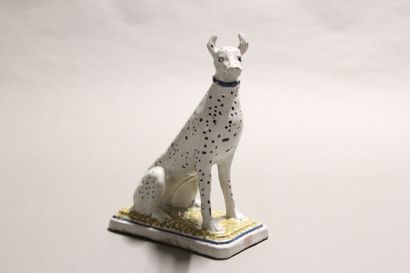 Pair of seated dalmatians in polychrome earthenware.

Rectangular...