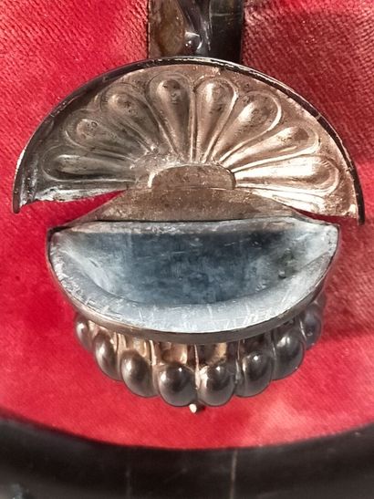 Christ on the cross in silver.

On a red...