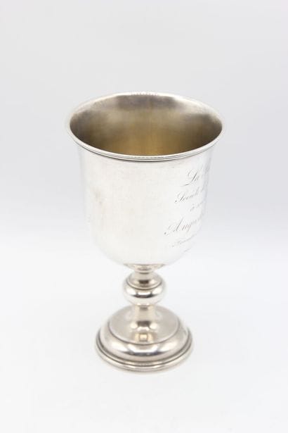 Cup on foot in silver.
On the body is inscribed...