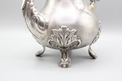 Silver coffee pot
Decorated with guilloche.
Rests...