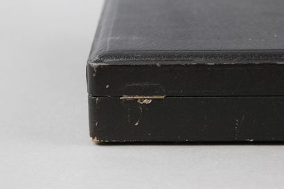 Wooden box with leather on the top of the...