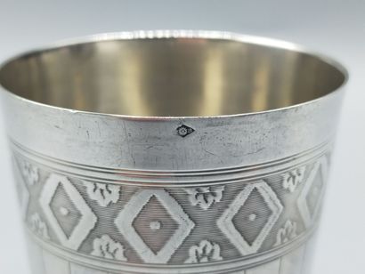 Silver tumbler with grooved decoration with...