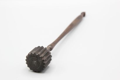 Wooden pusher for chocolate maker.
Rosewood...