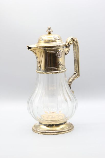 Pitcher with orangeade, mounting out of vermeil.
The...