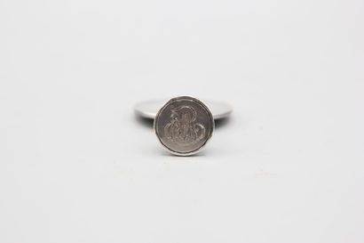 Silver seal representing Joan of Arc in armor...