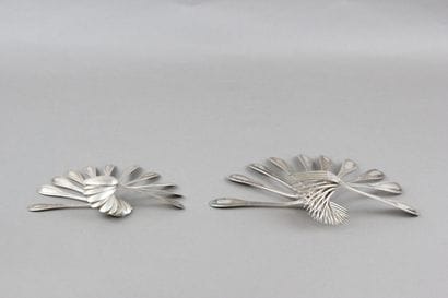 10 silver dessert forks and 11 coffee spoons,...