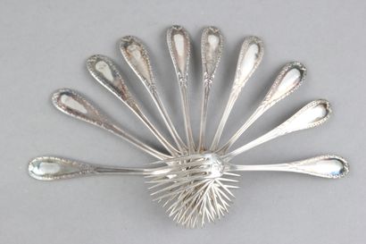 10 silver dessert forks and 11 coffee spoons,...