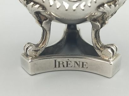 Silver egg cup with three clawed feet with...