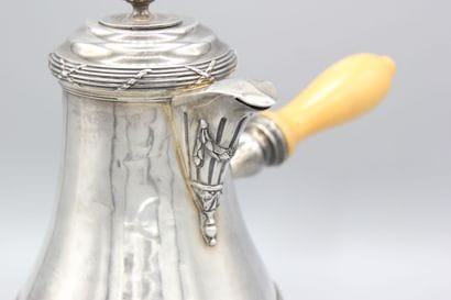 Chocolate pot in silver.
Decorated with crossed...