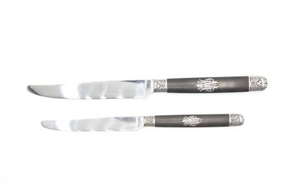 Double Set of knives with ebony handles inlaid...