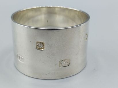 Service composed of its six silver napkin...