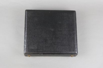 Wooden box with leather on the top of the...